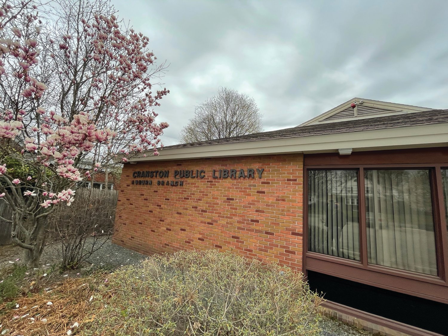 HOME FOR DECADES: The Auburn Branch of the Cranston Public Library has roots dating back to 1888. It occupied a number of locations during its first 100 years before its permanent home at 396 Pontiac Ave. opened in 1991.